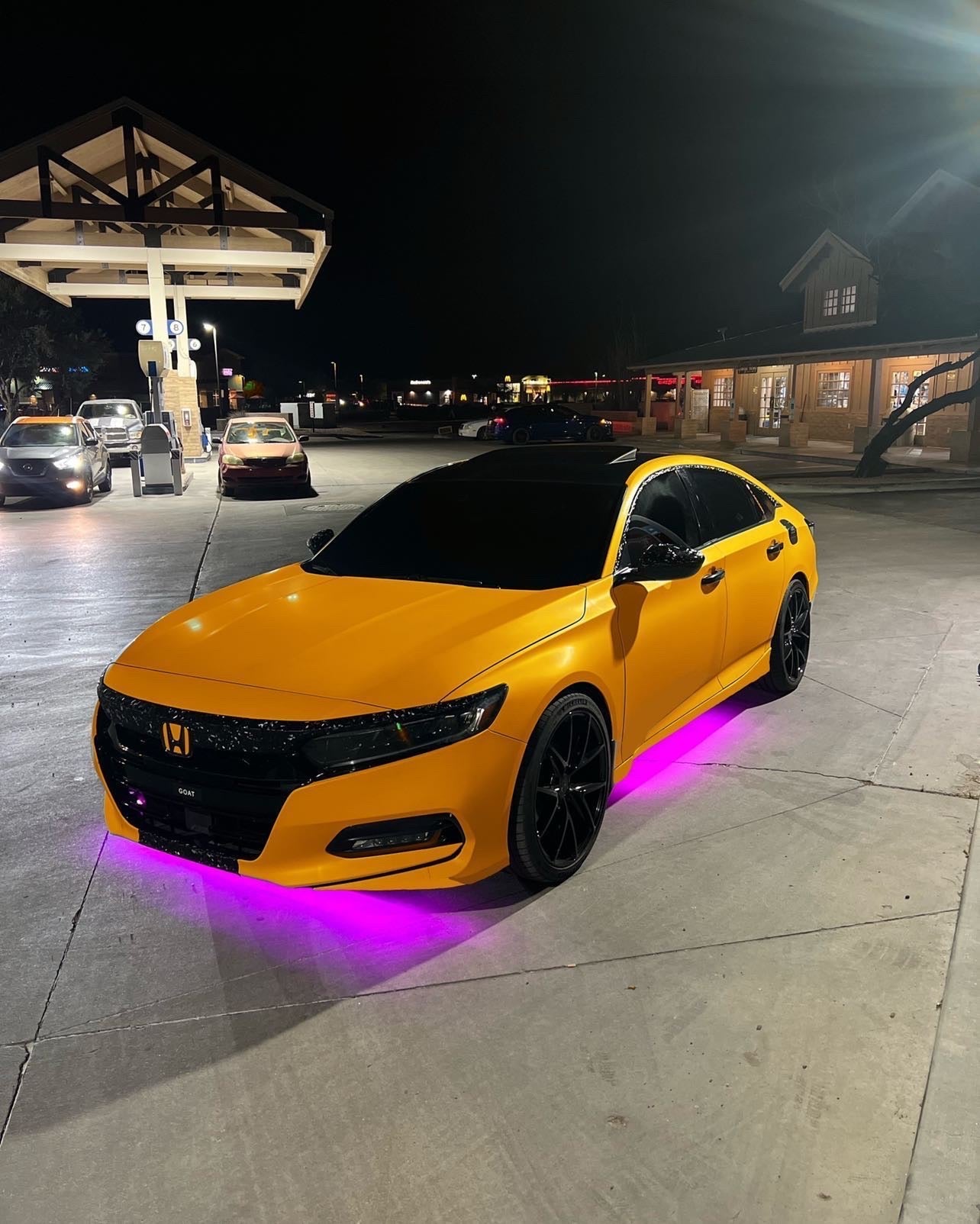 Purple Underglow Lights on Orange Car